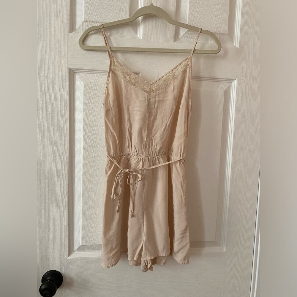 H&M cream romper with lace embellished top and tie waist
